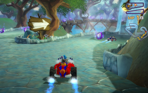 A red kart racing through a forest track